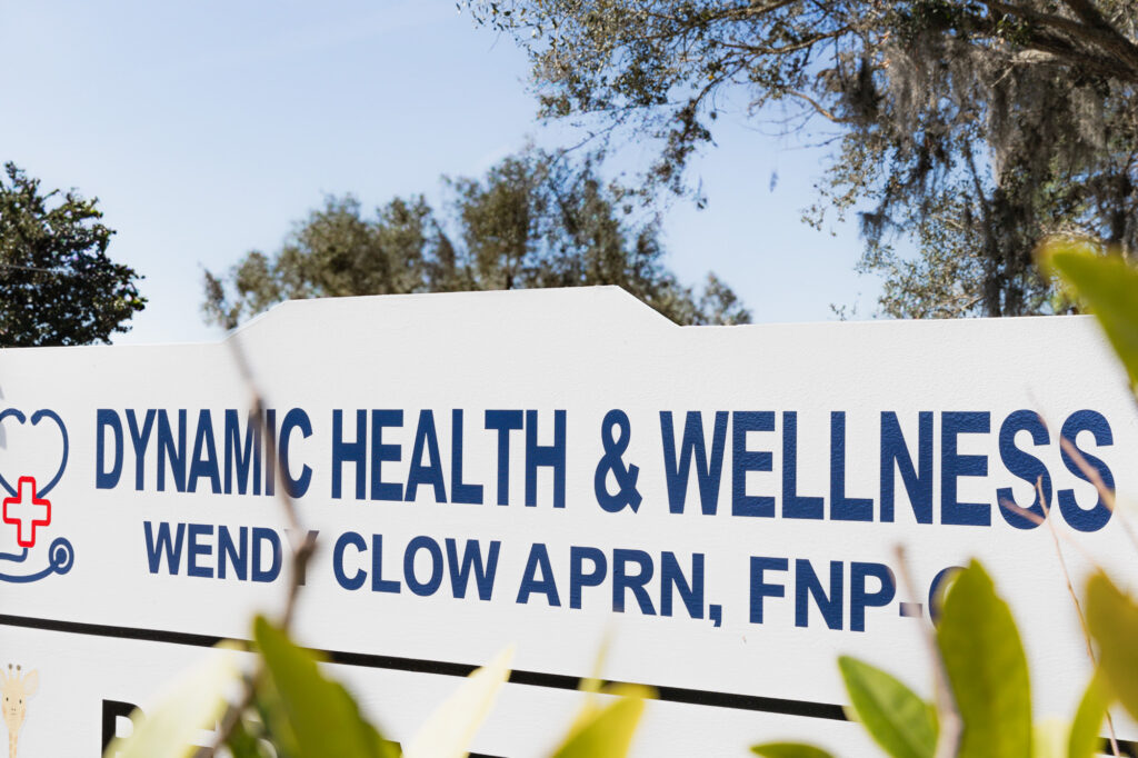 Exterior shot of Dynamic Health & Wellness sign welcoming guests to come to their center for lip injections near The Villages