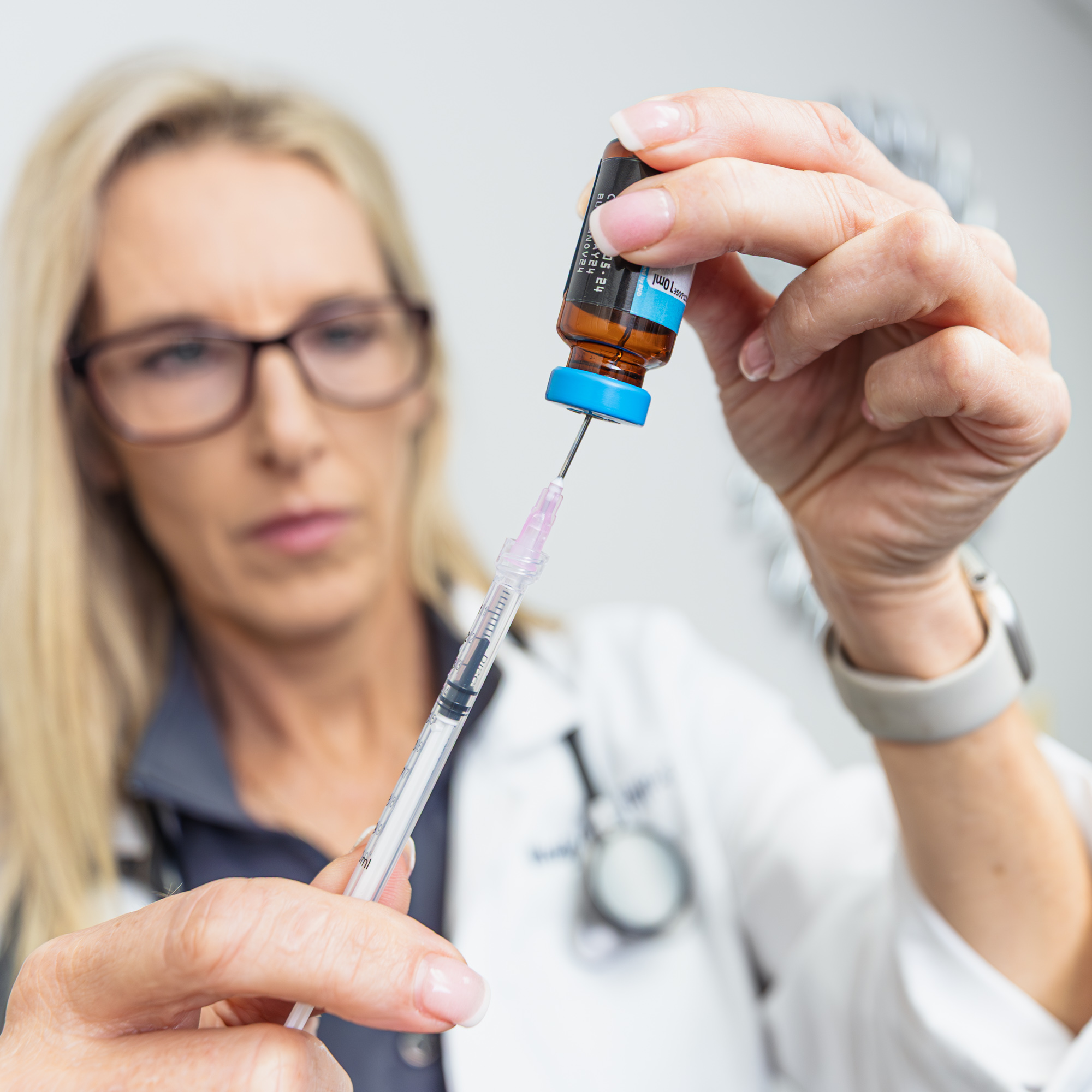 Wendy Clow, the nurse practitioner at Dynamic Health and Wellness, measuring the proper dosage of semaglutide for patient as part of a comprehensive weight loss program in Leesburg.