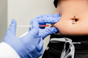Weight loss injection into females abdomen
